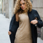 Black Coat and Nude Suede Style Dress .