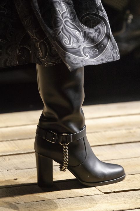 Black leather boot by Michael Kors