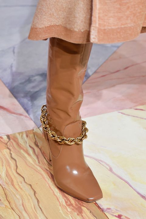 Brown patent leather boot by Ulla Jonhson 